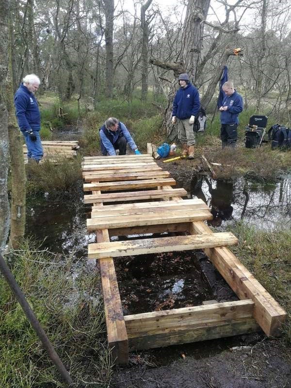 Building a new bridge with other volunteers; Herman Birchwood