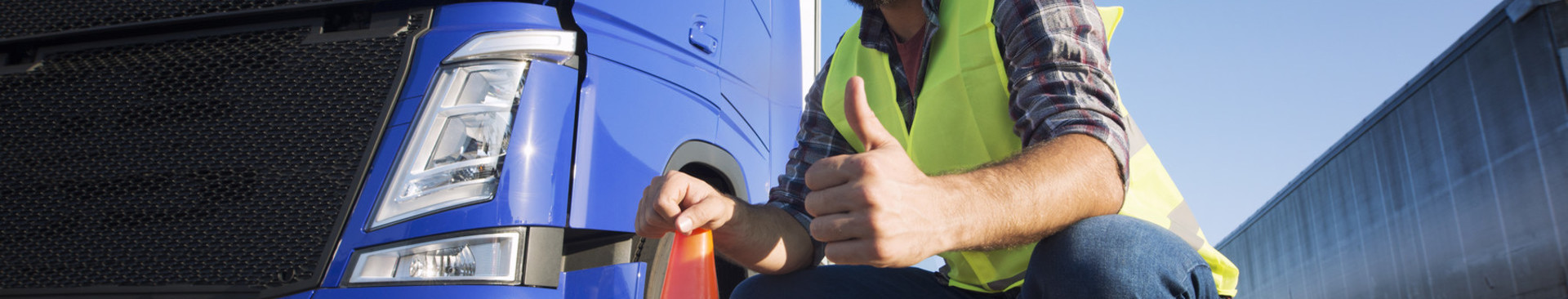 code-95-bb/man-learning-how-drive-truck-driving-schools